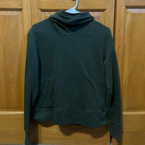 Green woman’s M Under Armor hoodie.